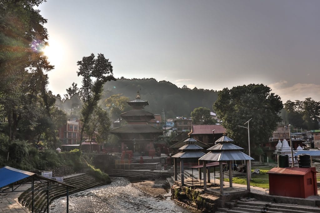Gokarneshwor Mahadev Temple, a historic and sacred Hindu temple dedicated to Lord Shiva, surrounded by lush greenery and located near the Bagmati River in Kathmandu, Nepal.