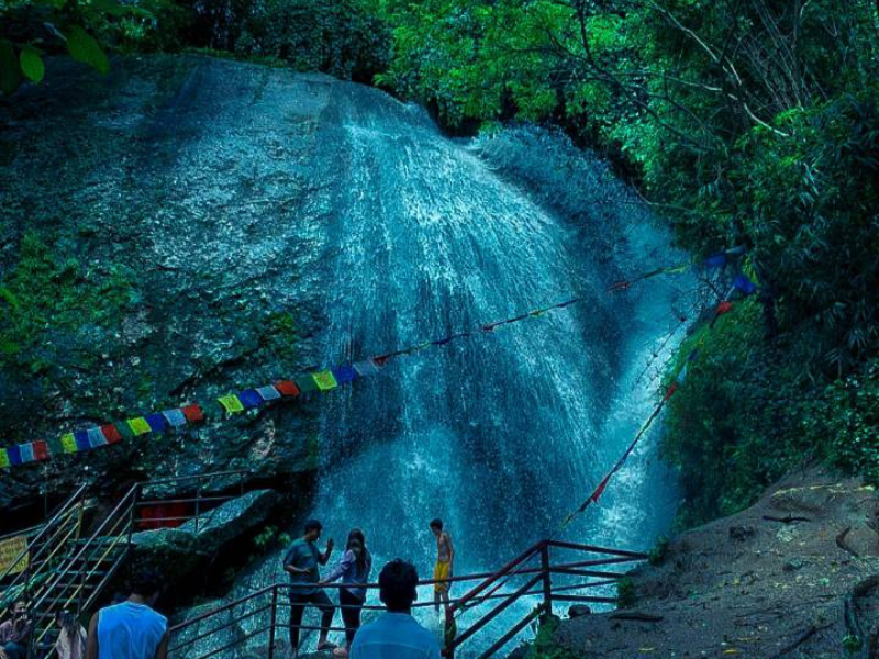 Jhor Waterfall, a picturesque waterfall surrounded by lush greenery near Kathmandu, Nepal, popular for nature lovers and hikers seeking a tranquil escape in the hills.