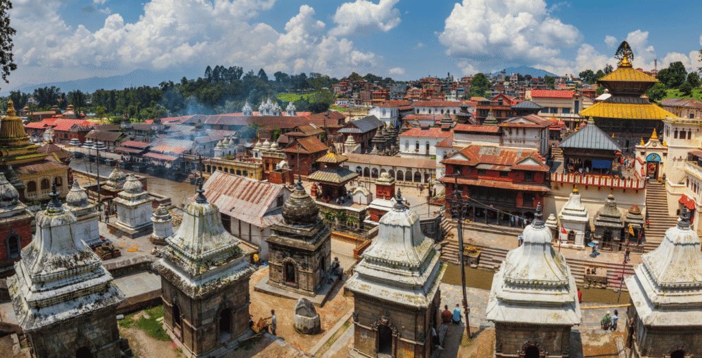 Pashupatinath Temple, a sacred Hindu temple dedicated to Lord Shiva on the banks of the Bagmati River in Kathmandu, Nepal, featuring pagoda-style architecture, golden roofs, and active worship by devotees.