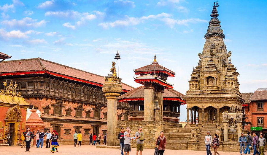 Bhaktapur Durbar Square, a UNESCO World Heritage site in Nepal, showcasing traditional Newari architecture with ancient temples, palaces, intricate wood carvings, and bustling local life in the historic city of Bhaktapur.